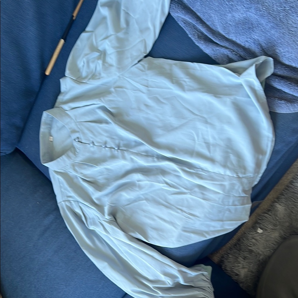 Woman’s Light Blue Shirt/ Blouse